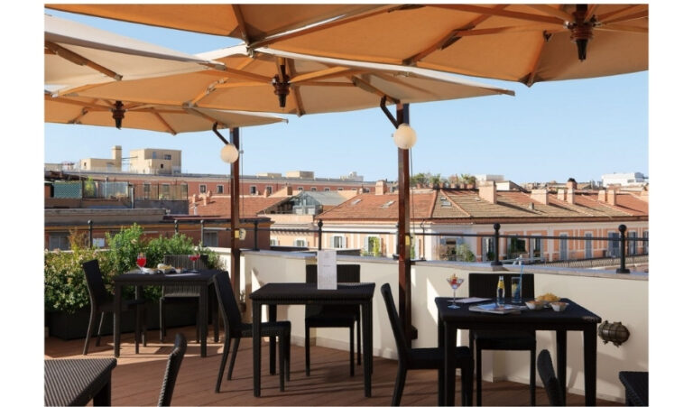 Expats at Ambrosia hotel roof top christmas party 2025 1 768x451